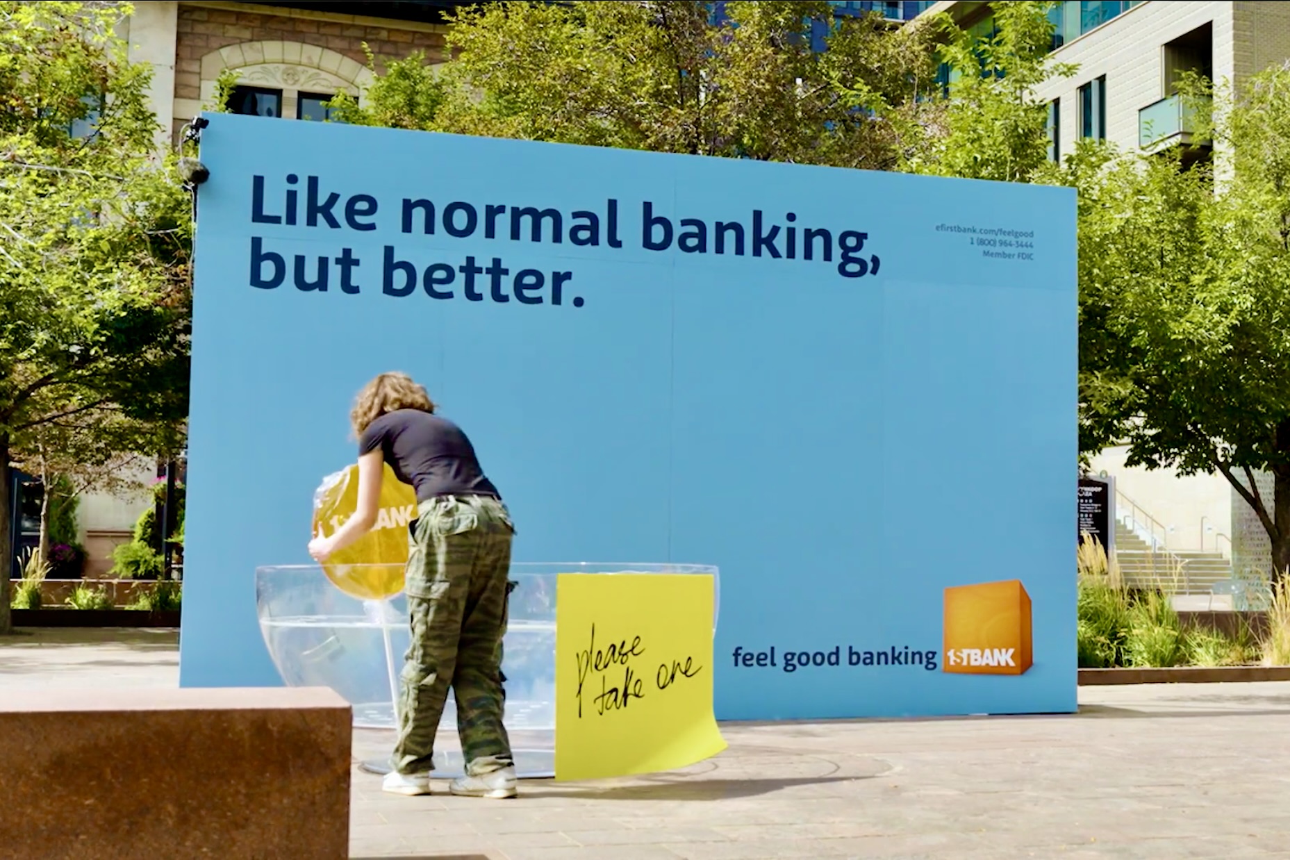 First Bank Lollipops live activation wall with branded oversized lollipops.